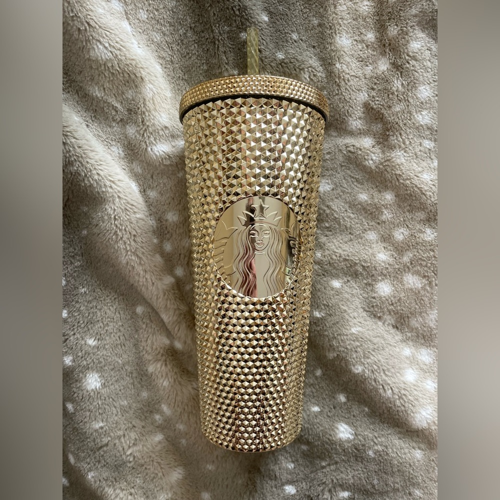 Venti gold Starbucks cup